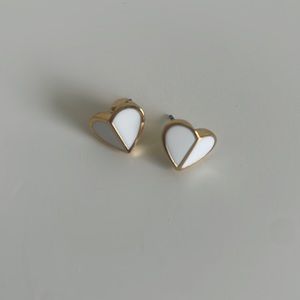 Kate Spade white and gold heart studs